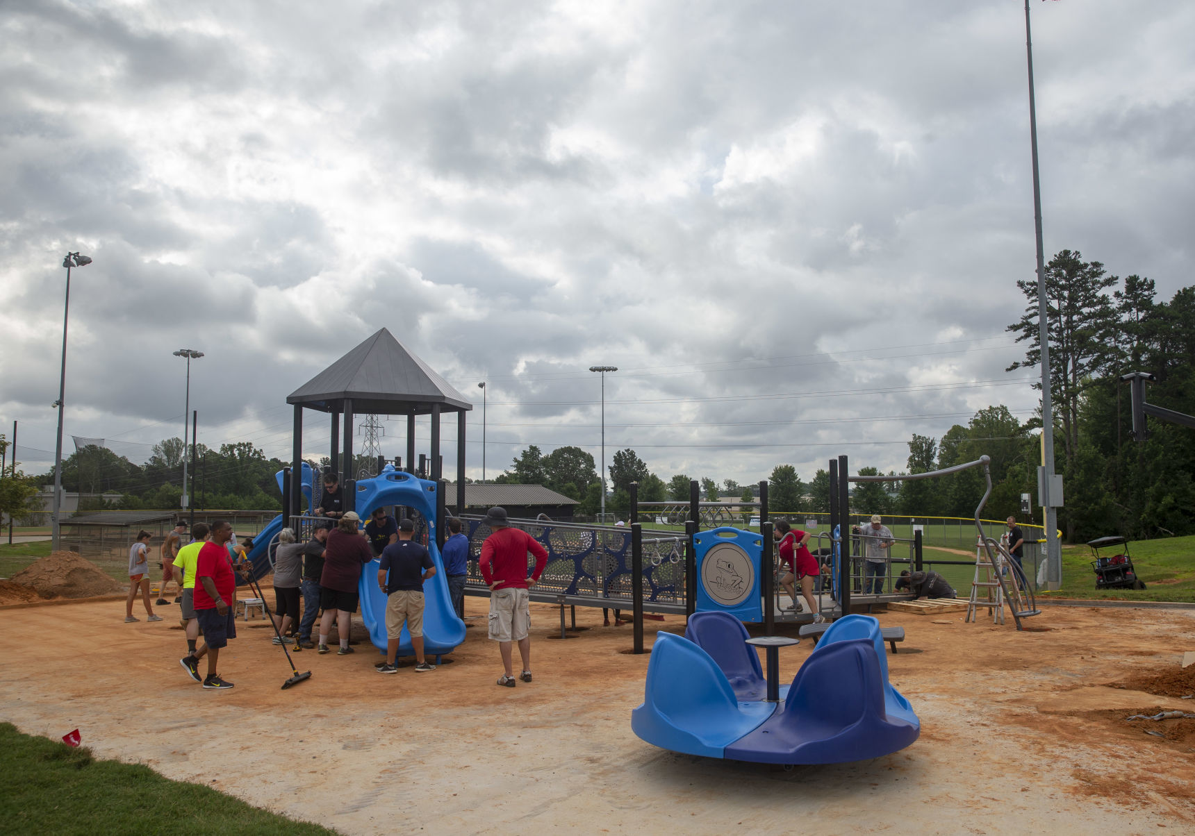Volunteers assemble playground